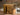 Golden oak stained antique icebox block with brass hardware, in situation