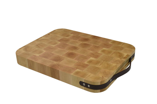 Double sided reversible wooden cutting board with leather slat handle